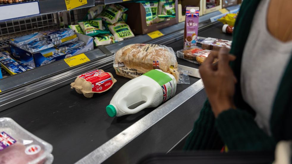 Person at supermarket checkout